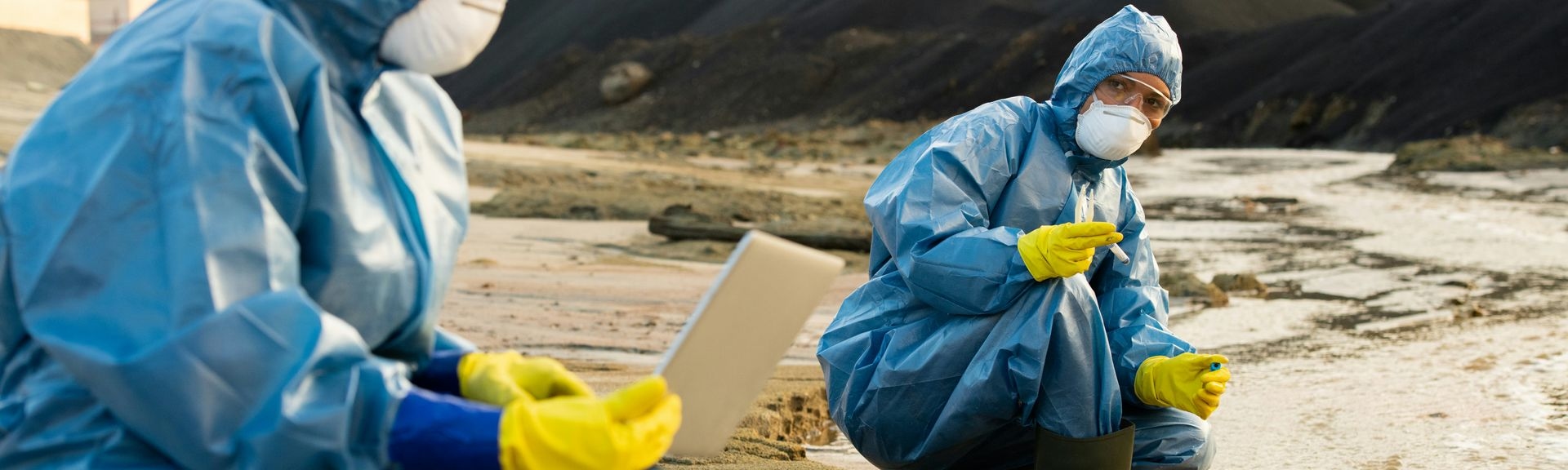 two technicians taking soil samples